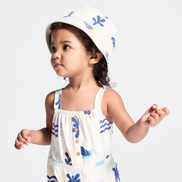 أفرول قصير أبيض بحمالات للطفلة الرضيعة